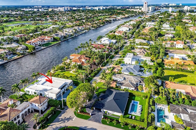 birds eye view of property featuring a water view