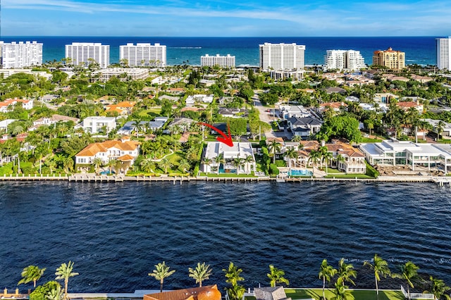 birds eye view of property featuring a water view