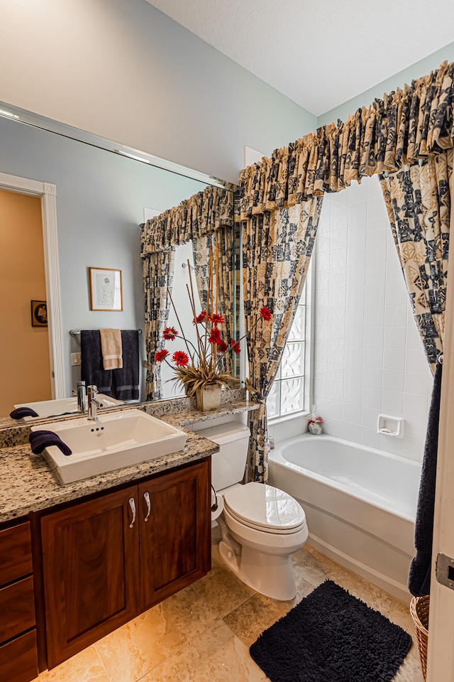 full bathroom featuring vanity, shower / bathtub combination with curtain, and toilet