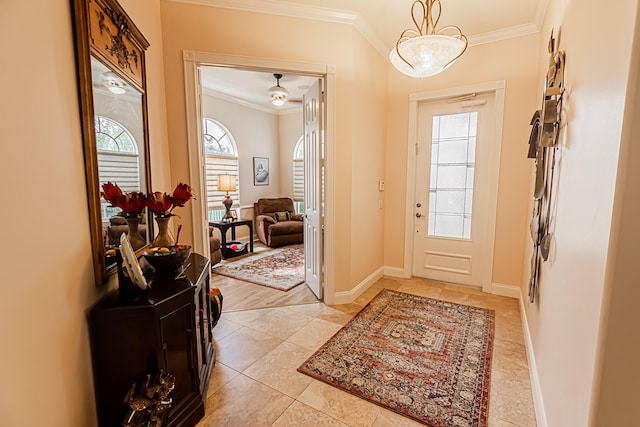 entryway featuring ornamental molding and light tile patterned floors