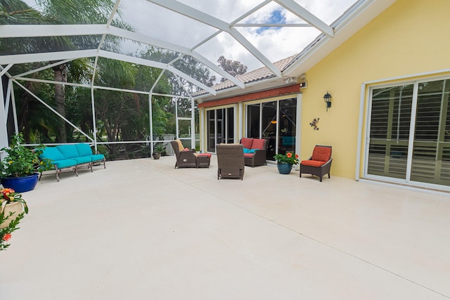 view of patio / terrace with outdoor lounge area and glass enclosure