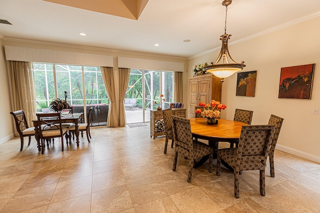 dining room featuring ornamental molding