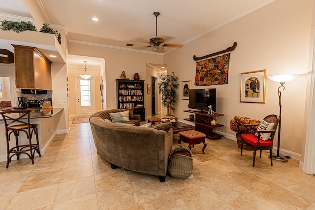 living room with crown molding and ceiling fan