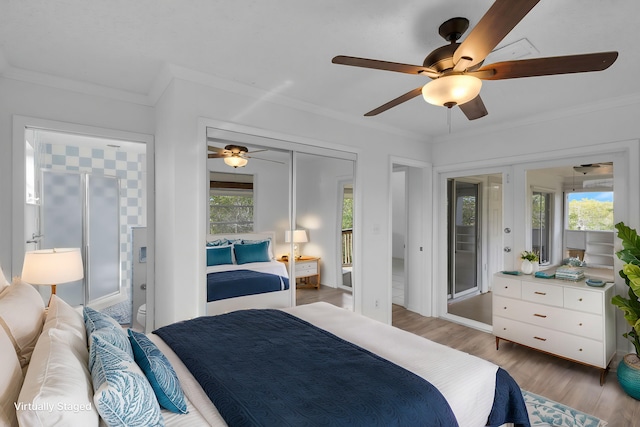 bedroom featuring ceiling fan, access to exterior, crown molding, and wood finished floors