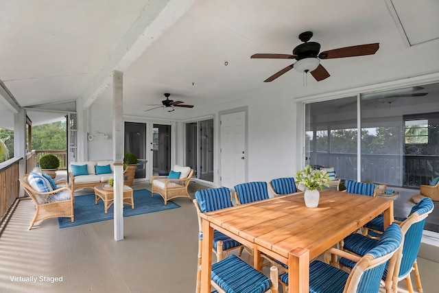 exterior space with ceiling fan