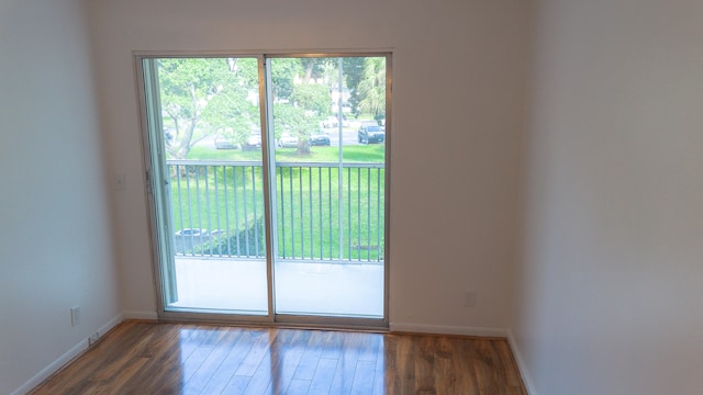 doorway featuring dark hardwood / wood-style floors