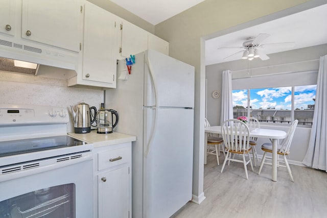 kitchen with ceiling fan, white appliances, ventilation hood, light hardwood / wood-style flooring, and white cabinets