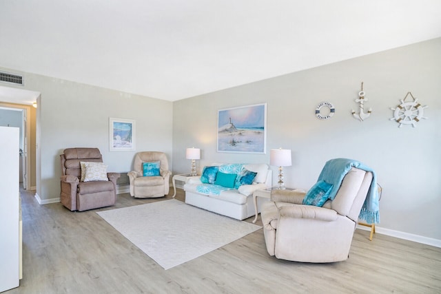 living room featuring light hardwood / wood-style floors