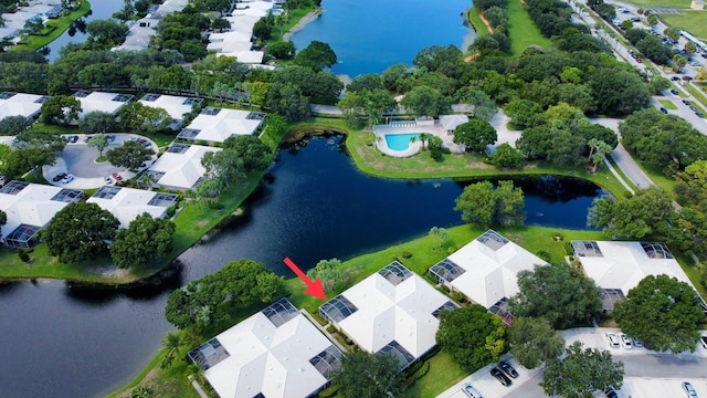 birds eye view of property featuring a water view