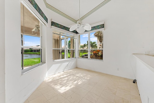 interior space featuring a water view and ceiling fan