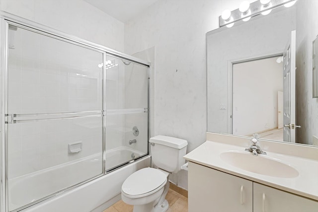 full bathroom with enclosed tub / shower combo, tile patterned floors, vanity, and toilet