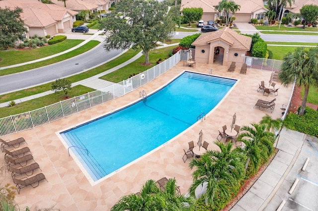 view of swimming pool featuring a patio area