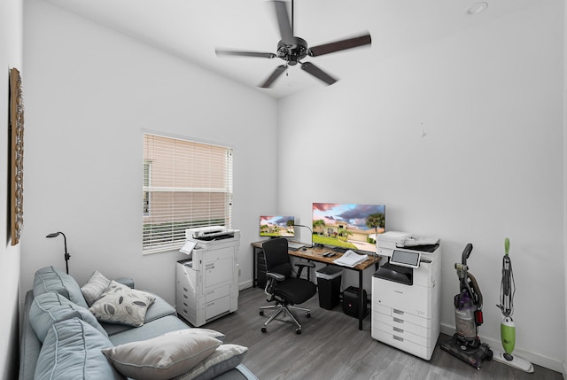 office space with ceiling fan and light hardwood / wood-style floors