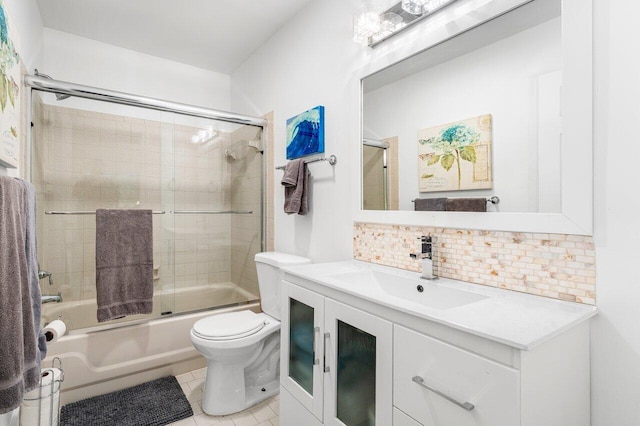 full bathroom with backsplash, vanity, enclosed tub / shower combo, tile patterned flooring, and toilet