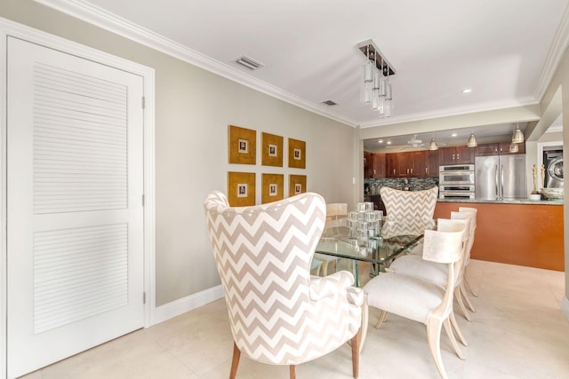 dining area with crown molding