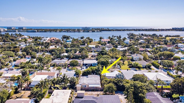 birds eye view of property featuring a water view