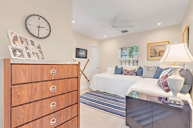 tiled bedroom with ceiling fan