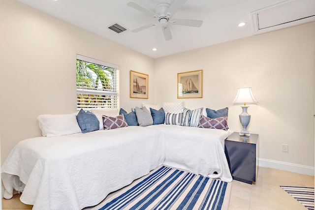 bedroom with ceiling fan and light tile patterned floors