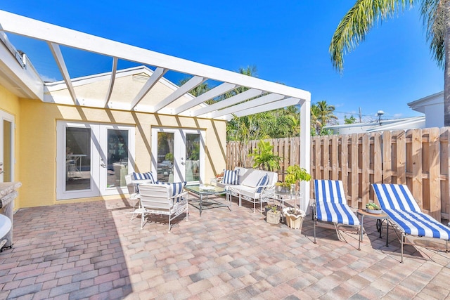 view of patio / terrace featuring a pergola, french doors, and an outdoor hangout area