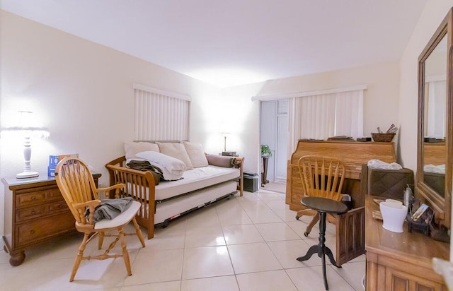 bedroom featuring light tile patterned floors