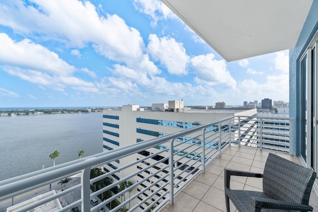 balcony featuring a water view