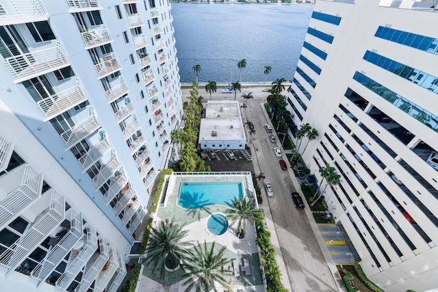 birds eye view of property with a water view