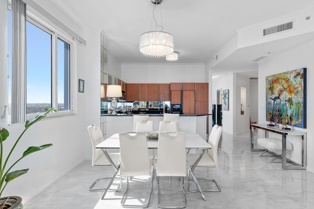 dining area with a chandelier