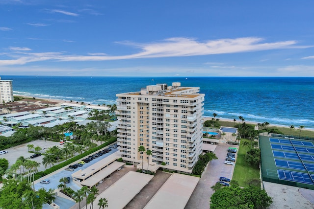 aerial view featuring a water view and a beach view