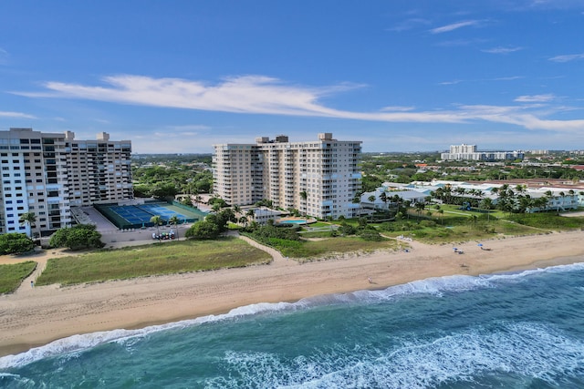 bird's eye view with a view of the beach and a water view