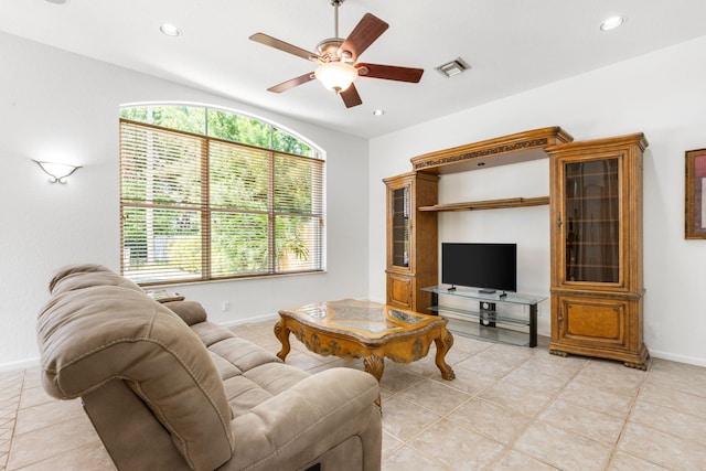 living room with light tile patterned flooring and ceiling fan