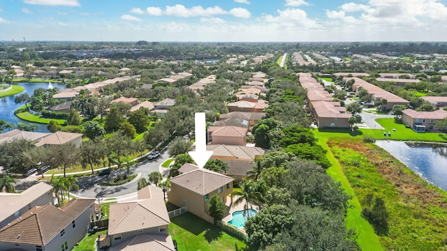 bird's eye view with a water view