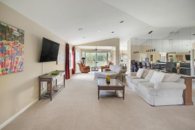 227 Legendary Cir, Palm Beach Gardens, FL 33418 - carpeted living area with lofted ceiling, baseboards, and recessed lighting