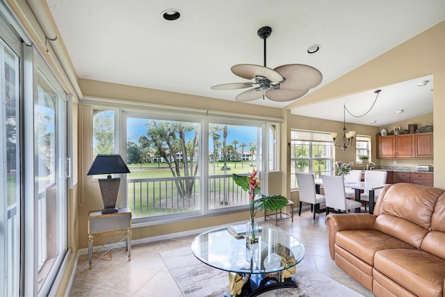 227 Legendary Cir, Palm Beach Gardens, FL 33418 - living area featuring light tile patterned floors, a ceiling fan, baseboards, lofted ceiling, and recessed lighting