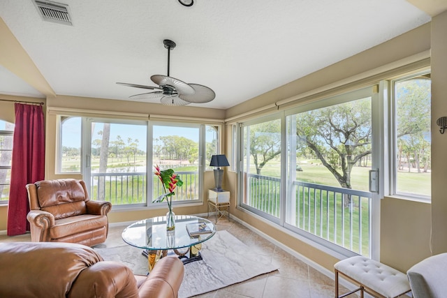 227 Legendary Cir, Palm Beach Gardens, FL 33418 - sunroom / solarium with baseboards and tile patterned flooring