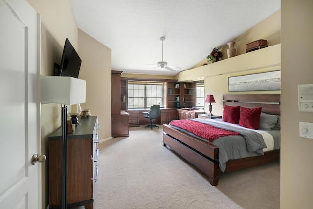 227 Legendary Cir, Palm Beach Gardens, FL 33418 - bedroom featuring light carpet, vaulted ceiling, ceiling fan, and a textured ceiling