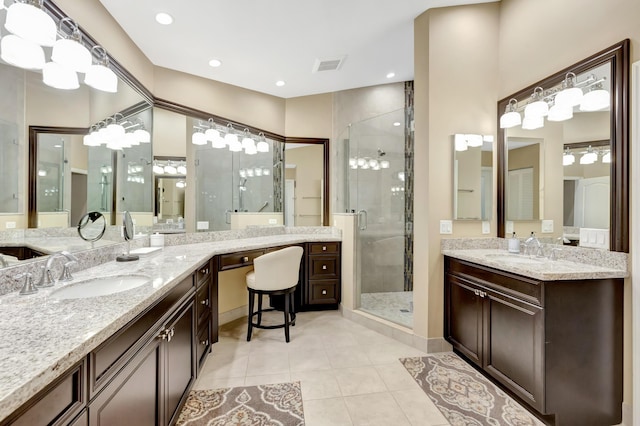 227 Legendary Cir, Palm Beach Gardens, FL 33418 - full bath with a stall shower, tile patterned flooring, and two vanities