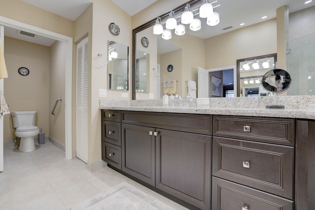 227 Legendary Cir, Palm Beach Gardens, FL 33418 - full bath featuring toilet, tile patterned floors, vanity, and baseboards
