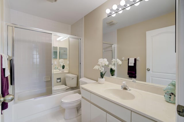 227 Legendary Cir, Palm Beach Gardens, FL 33418 - bathroom with toilet, tile patterned floors, bath / shower combo with glass door, and vanity