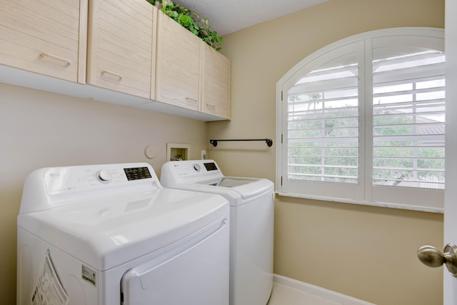 227 Legendary Cir, Palm Beach Gardens, FL 33418 - washroom with washer and dryer, cabinet space, and baseboards