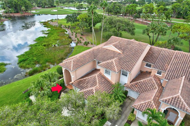 227 Legendary Cir, Palm Beach Gardens, FL 33418 - view from above of property with a nearby body of water and a tree filled landscape