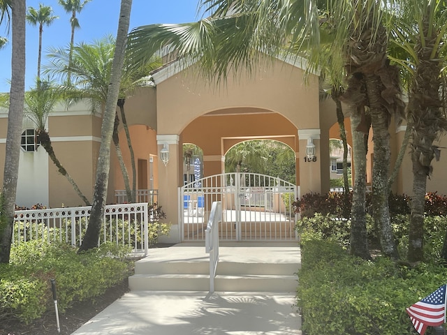 227 Legendary Cir, Palm Beach Gardens, FL 33418 - exterior space featuring a gate and fence