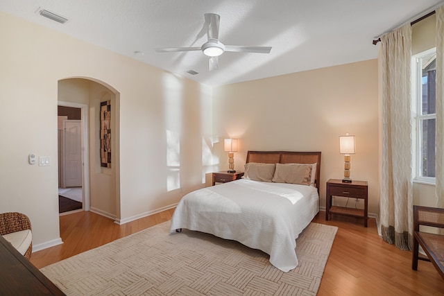 bedroom featuring light wood-type flooring and ceiling fan