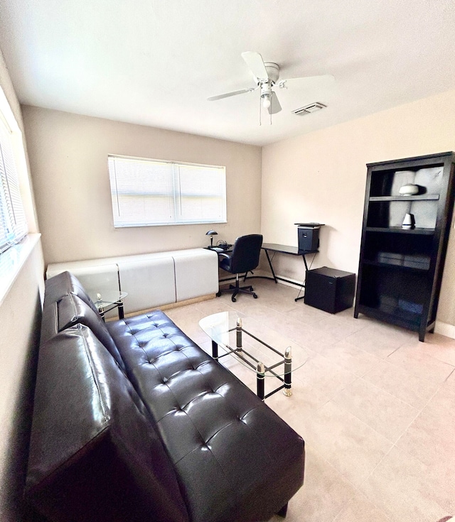 living room featuring ceiling fan