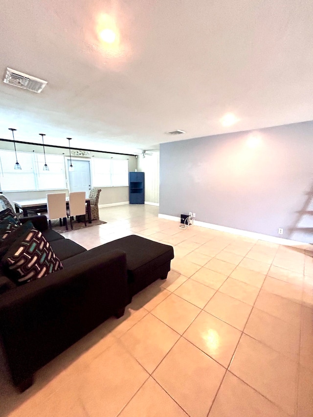 living room with light tile patterned flooring