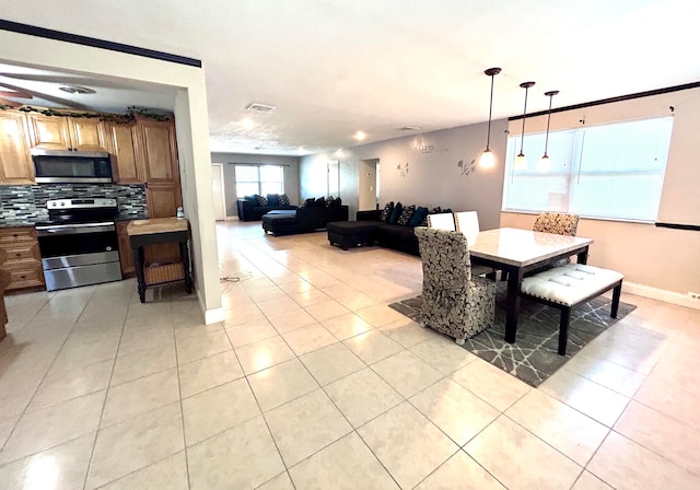 dining room with light tile patterned floors