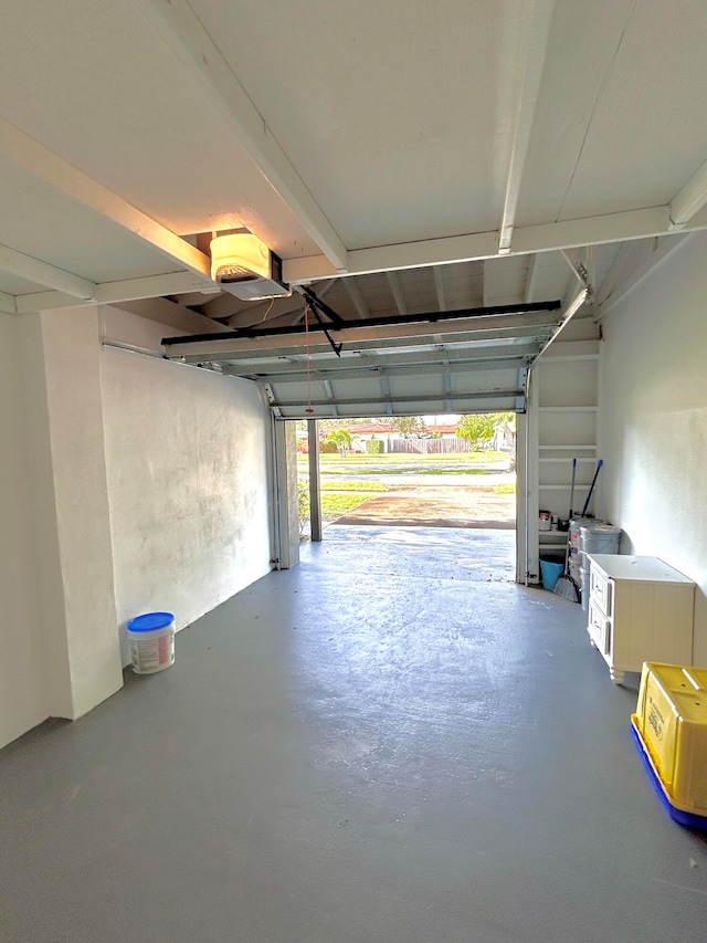 garage featuring a garage door opener