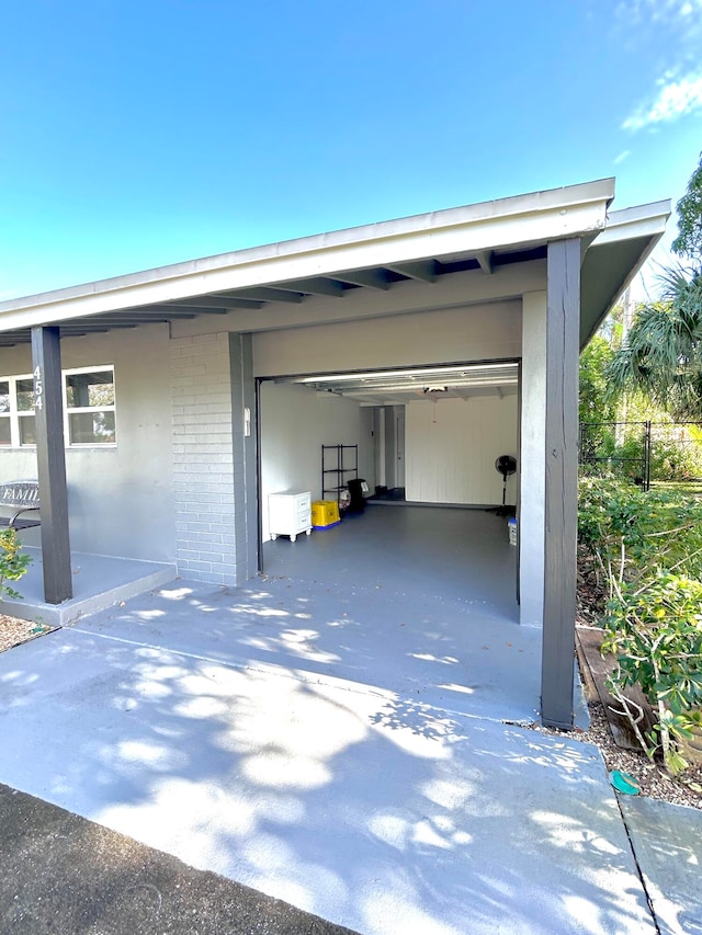 garage with a carport