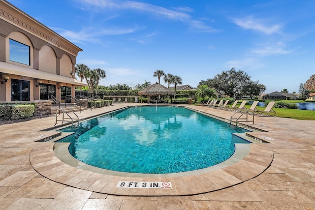 view of pool featuring a gazebo and a patio area