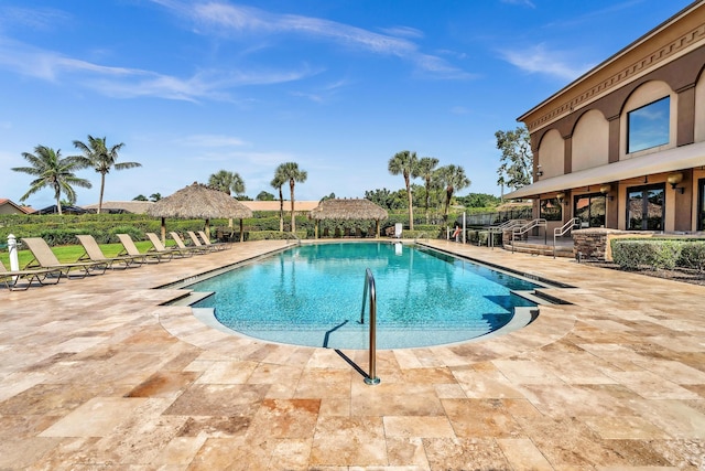 view of swimming pool featuring a patio