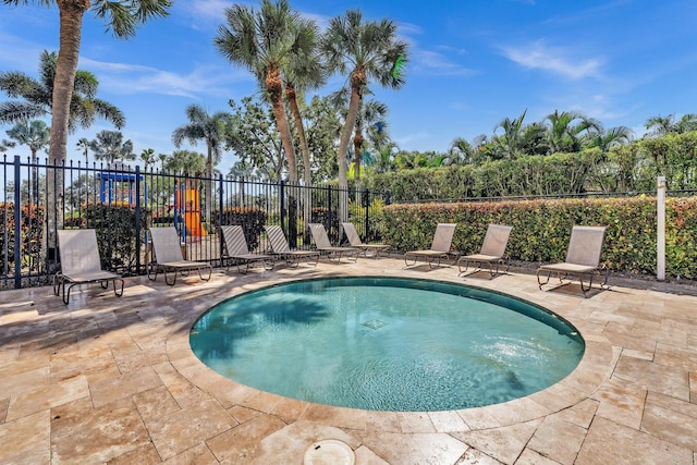 view of swimming pool featuring a patio